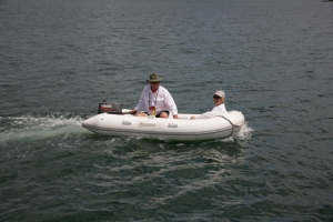 Chuck and Mavis in the dinghy